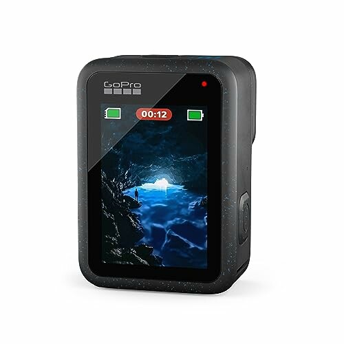 GoPro HERO12 Black camera displaying a cave scene on its screen.